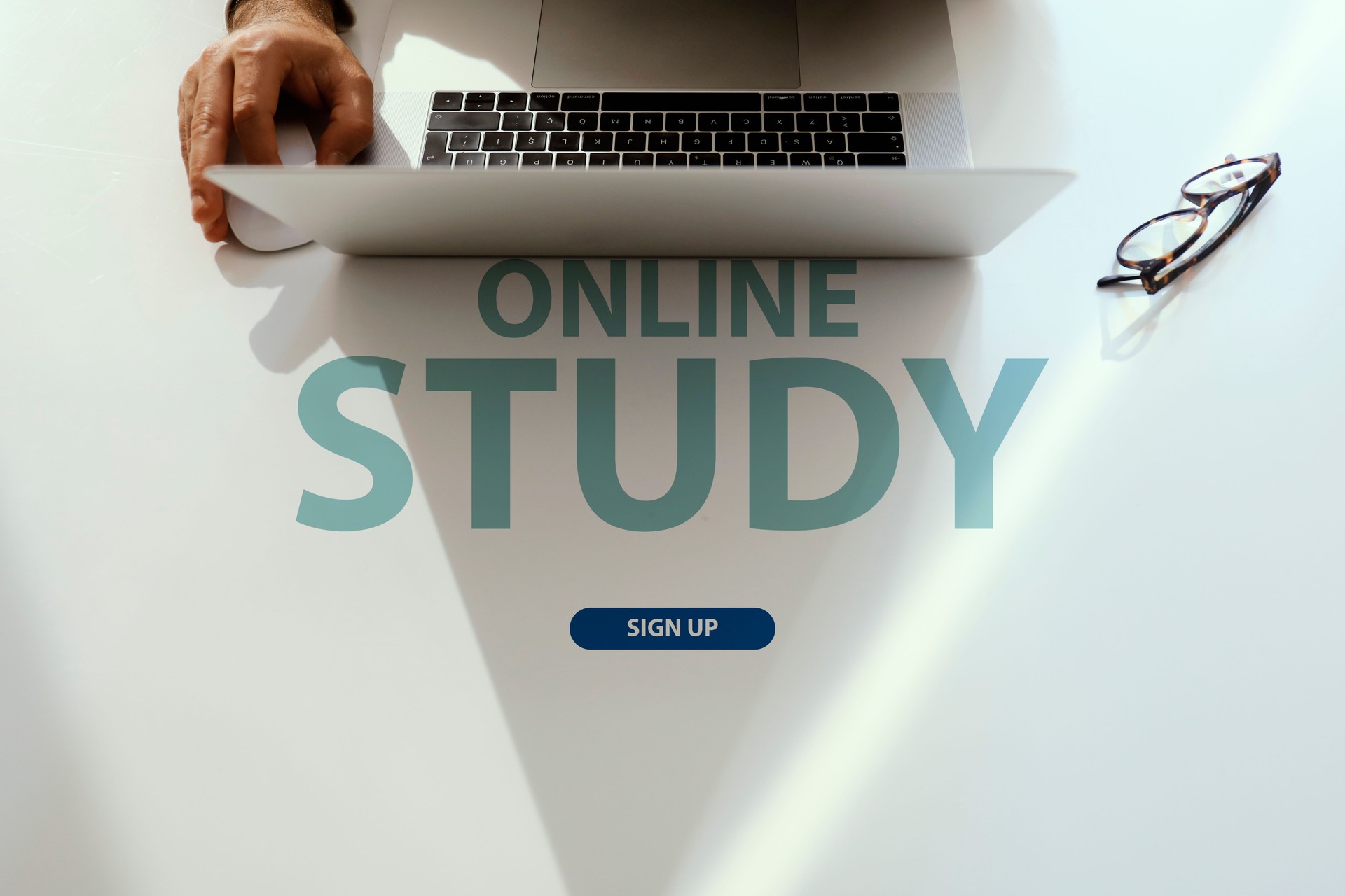 Laptop with online study text on a desk